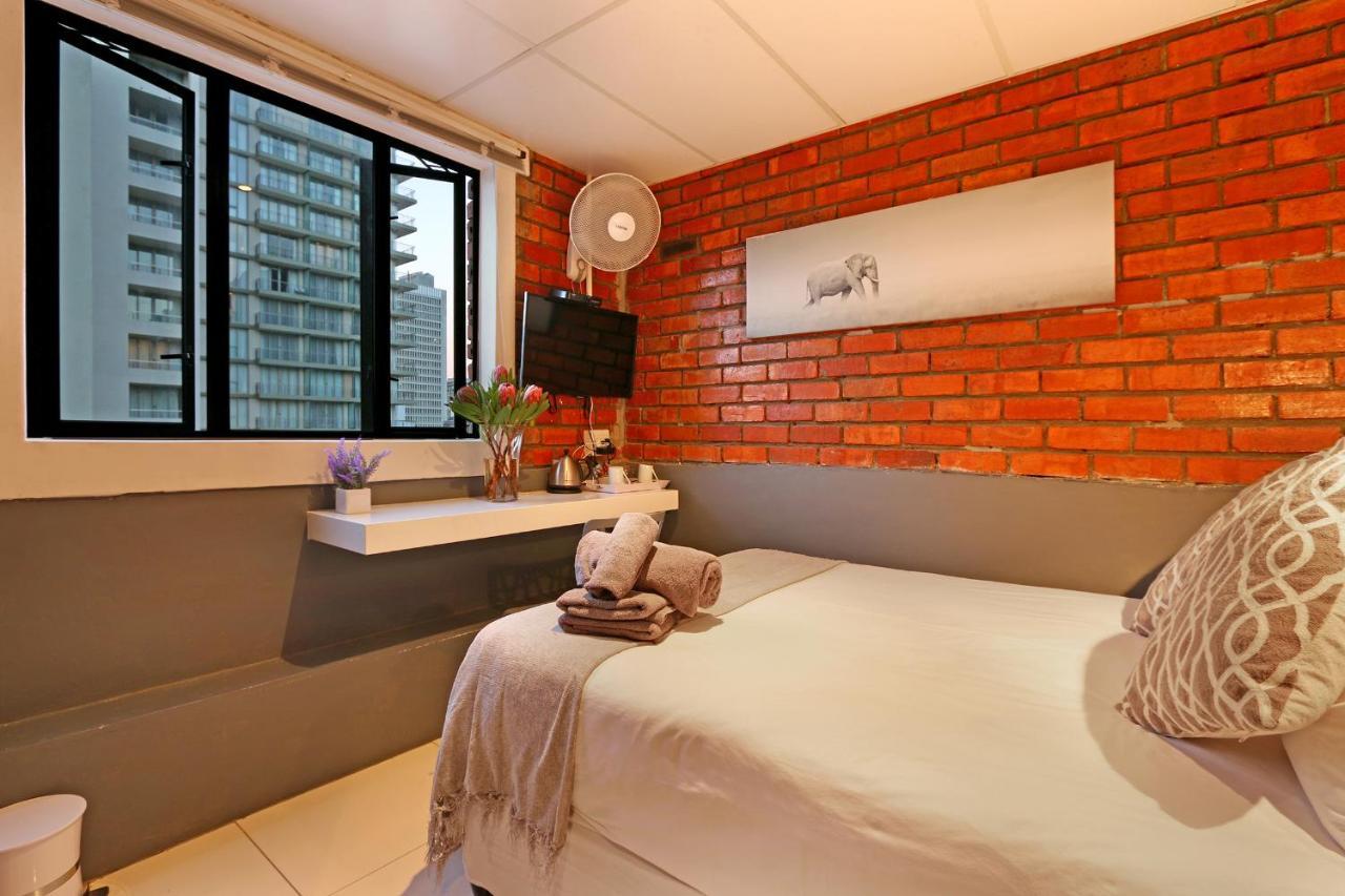 The Rhino Hotel & Apartments Kaapstad Buitenkant foto